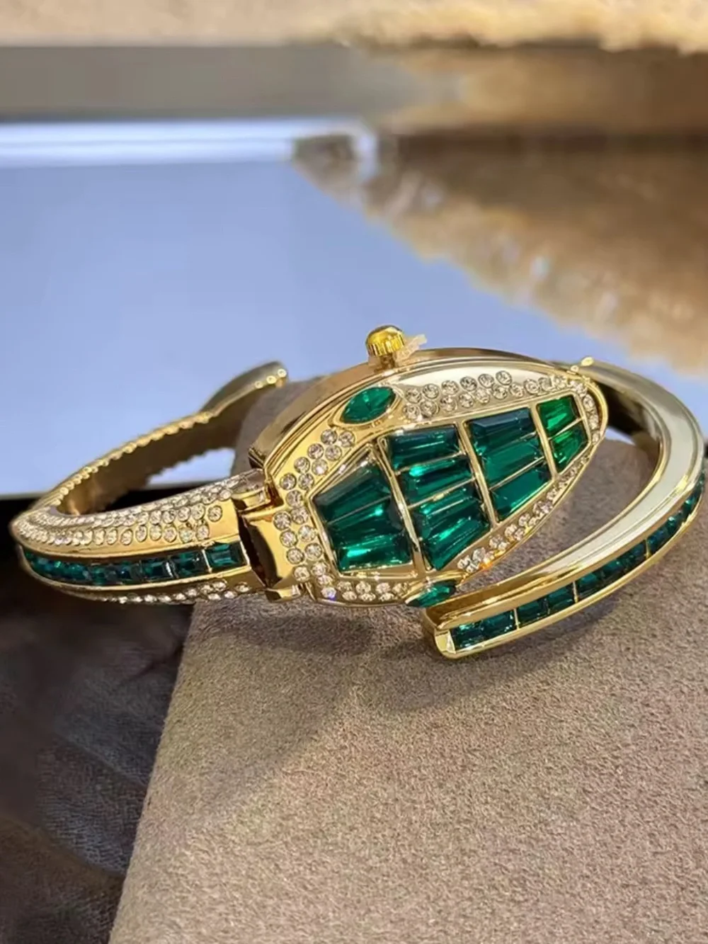 Gold-Tone Serpent Cuff Watch with Emerald Green Crystals